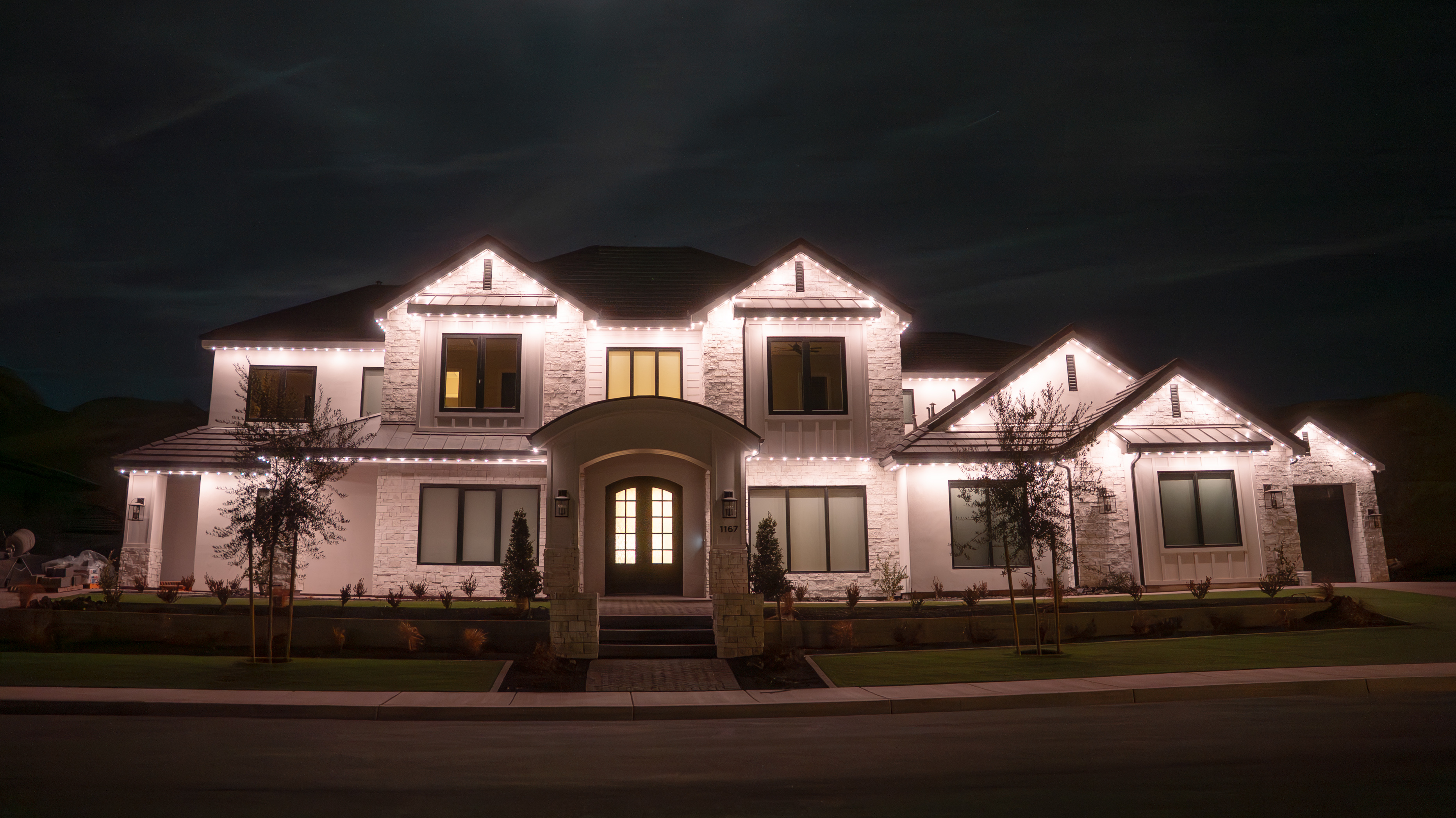 Custom color matched permanent lights on home trim