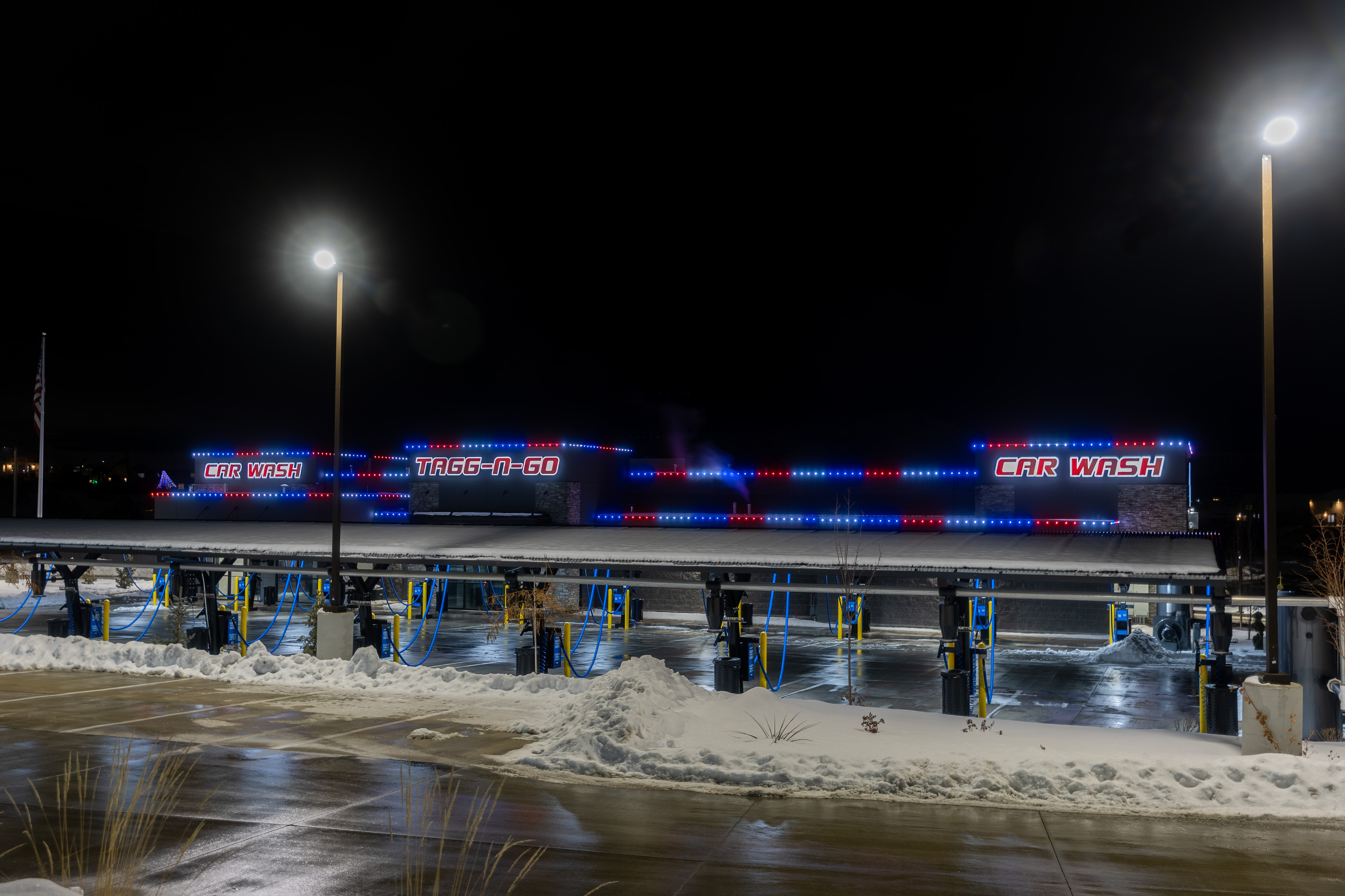 Business storefront with permanent exterior lighting